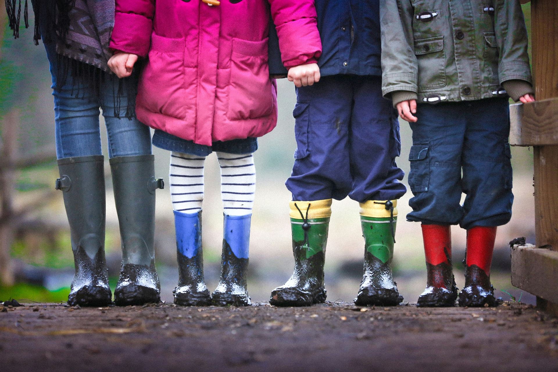 a group of children in wellies