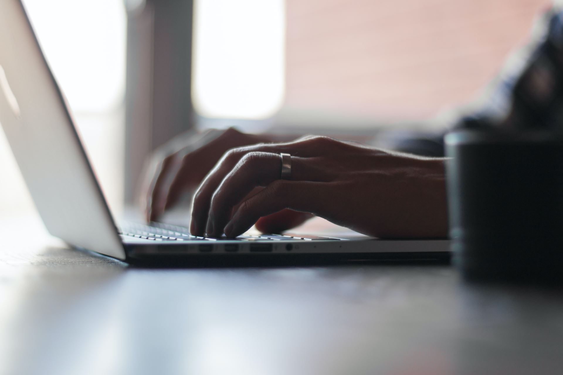 a person using a laptop computer